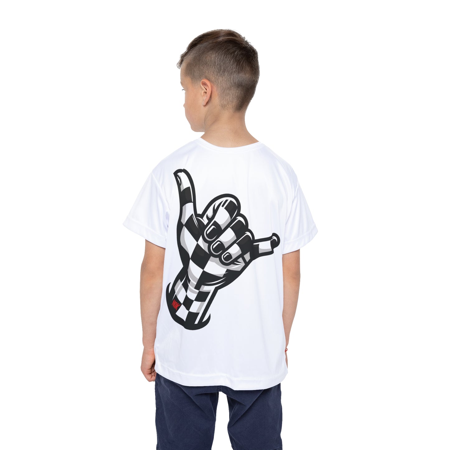 Young boy wearing a white T-shirt with a large checkered shaka hand graphic on the back, showing playful and stylish vibes.