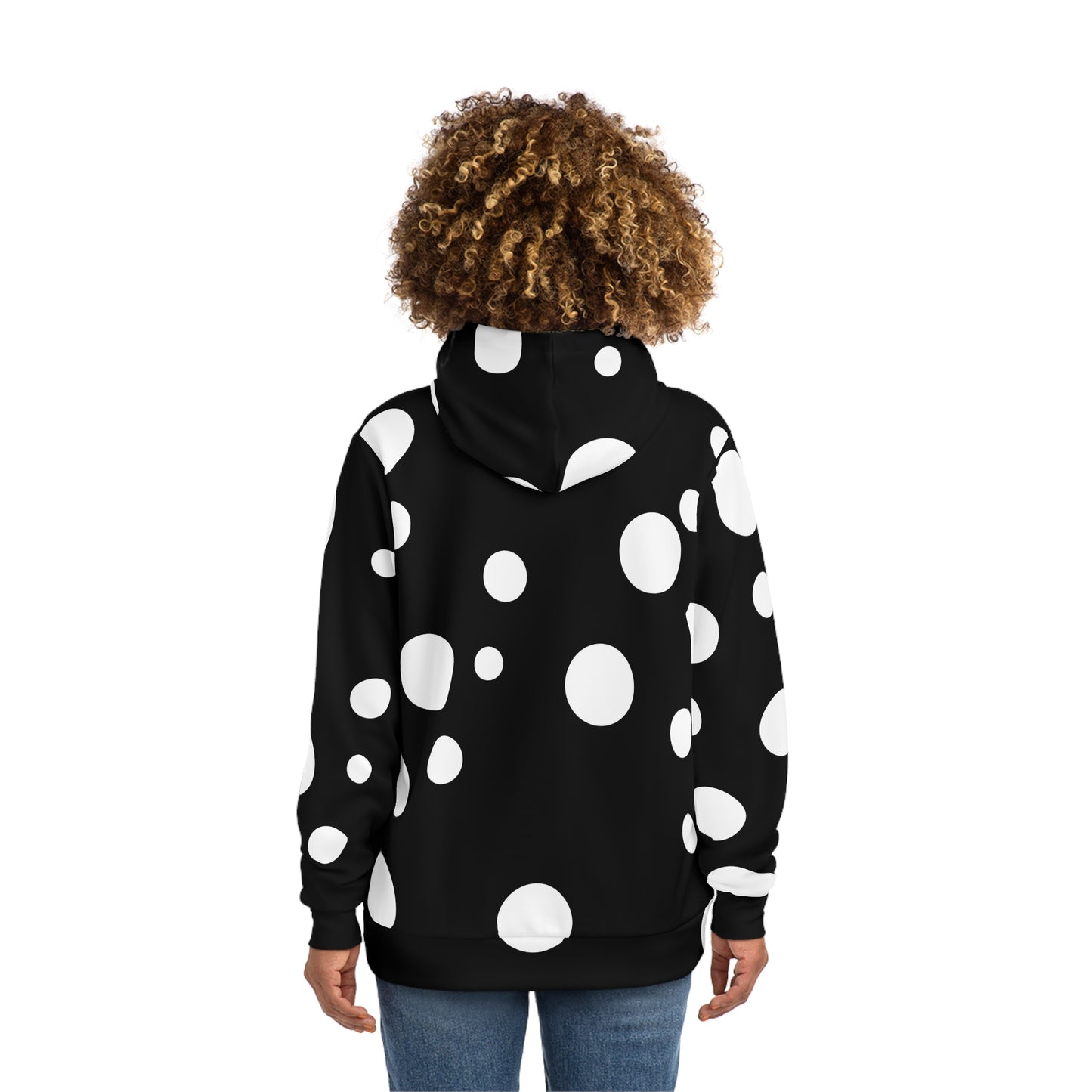 Back view of a woman wearing a black hoodie featuring bold white circular patterns, part of NOK's urban collection.