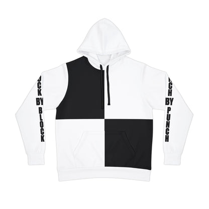 Front view of a black and white split hoodie with contrasting color blocks. The hoodie features bold text 'Block by Block' running down the sleeves, and black drawstrings for added style.