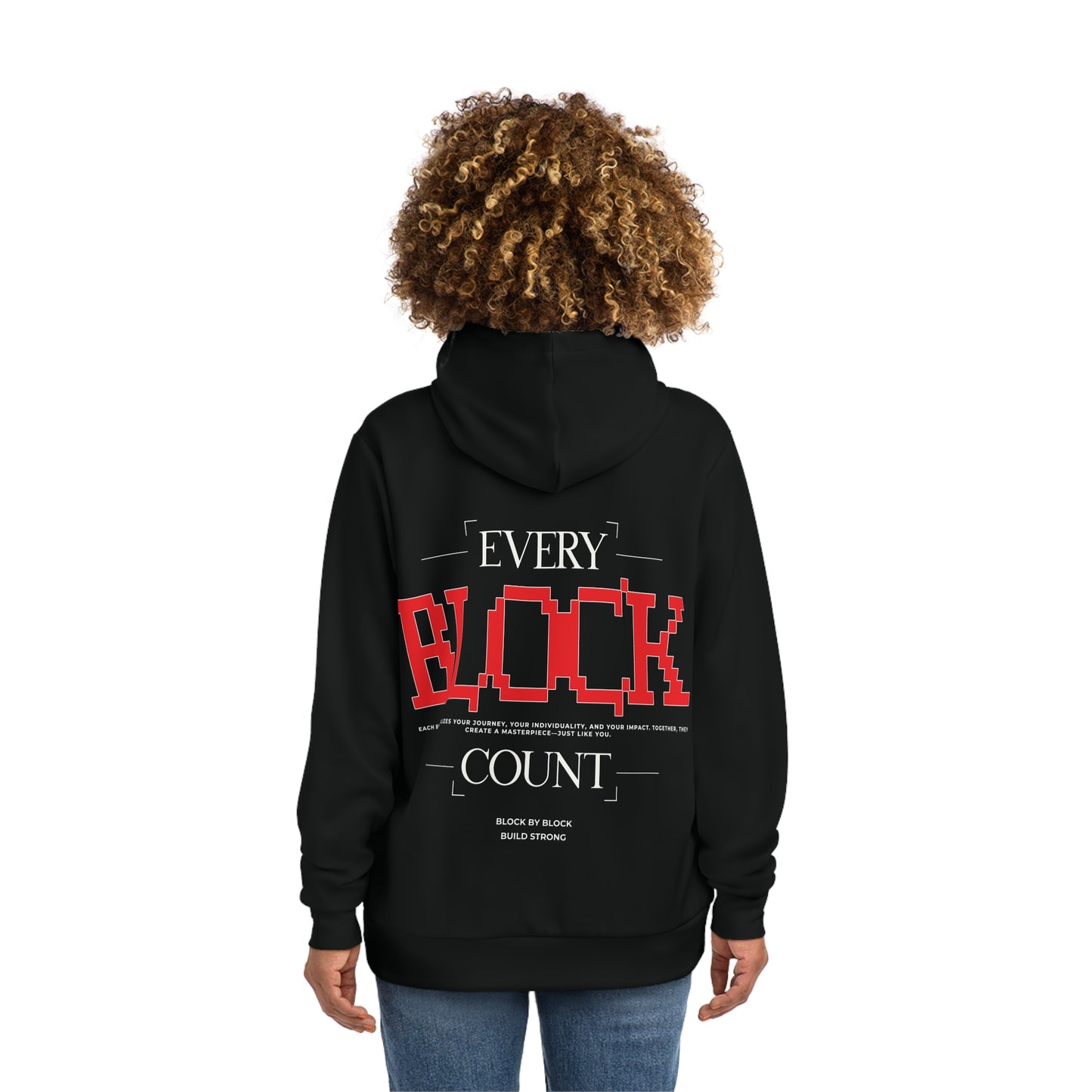 Back view of a black hoodie modeled by a woman, showcasing the statement design 'Every Block Count' in bold red pixelated typography.
