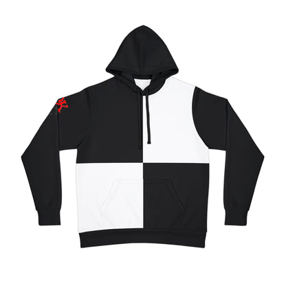 Flat lay of a black and white hoodie with a clean color-blocked front, showcasing its minimalist yet bold design.