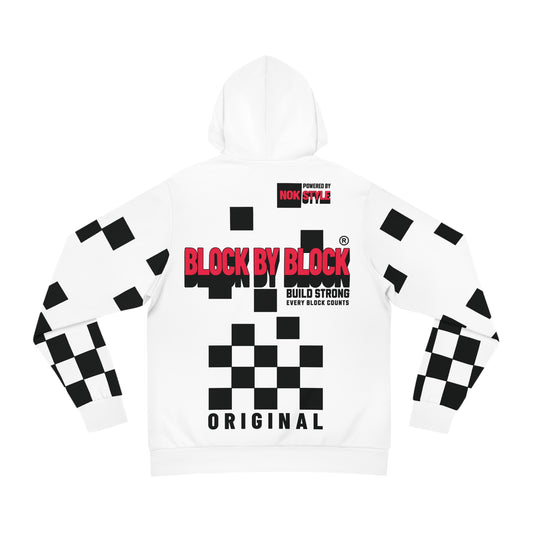 Flat lay of a white hoodie featuring black checkered sleeves and a bold 'Block by Block' text and logo design on the back.