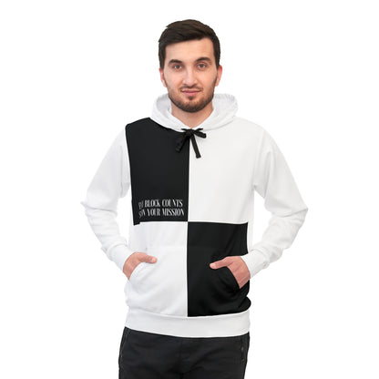 Front view of a white and black hoodie modeled by a man, featuring a minimalist split design with the text 'Every Block Counts. Stay on Your Mission.