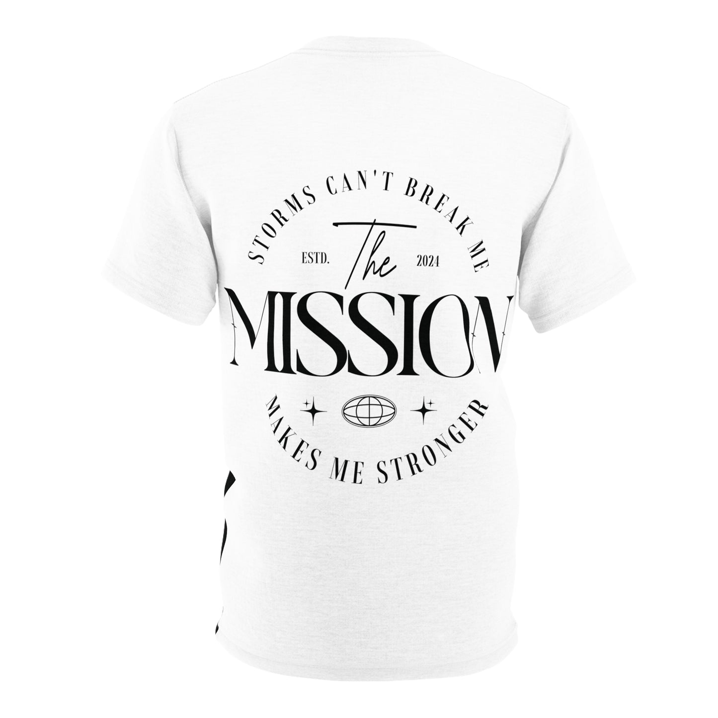 Flat lay of the T-shirt's back, featuring 'Storms Can’t Break Me. Makes Me Stronger. The Mission' in bold typography for a motivational statement.