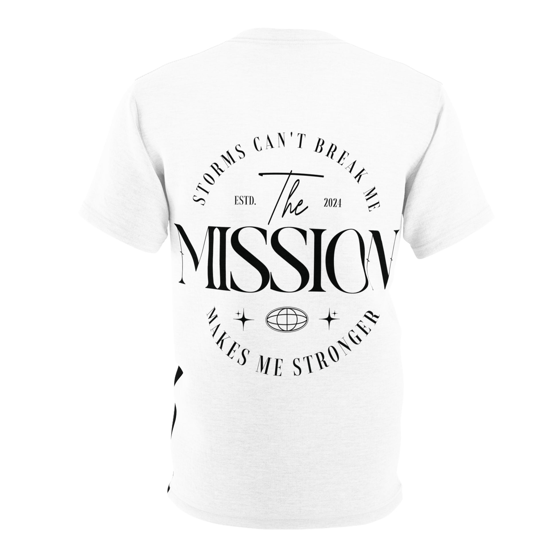 Flat lay of the T-shirt's back, featuring 'Storms Can’t Break Me. Makes Me Stronger. The Mission' in bold typography for a motivational statement.