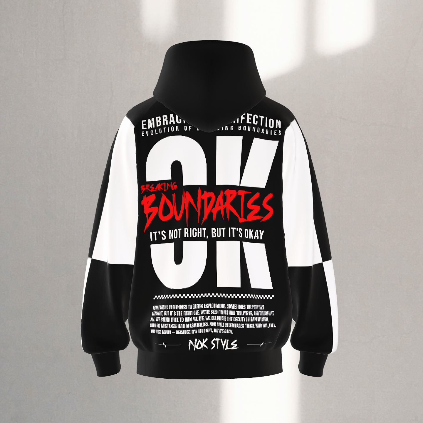 Back view of NOK Style Adult Hoodie showcasing bold red typography with the message "Breaking Boundaries."
