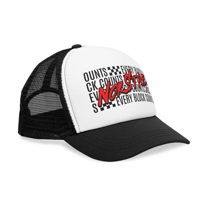 Side view of a NOK Style trucker cap in black and white, featuring 'Every Block Counts' design with bold text.