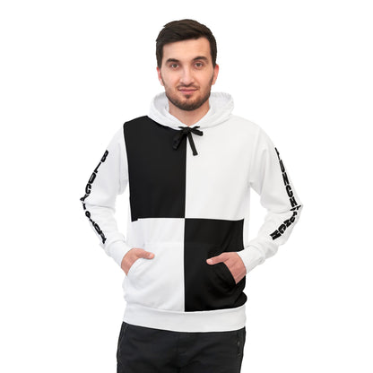 Male model wearing the black and white 'Block by Block' hoodie. The hoodie features a split design with bold block letters on the sleeves, showcasing a casual and modern streetwear look.