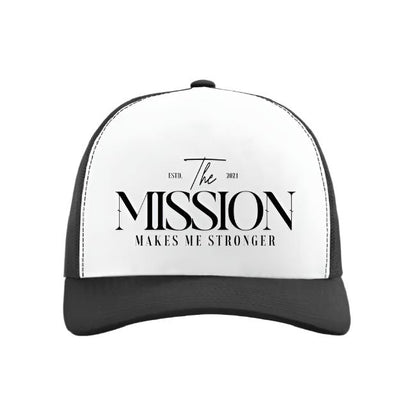 Black and white Trucker Cap with 'The Mission Makes Me Stronger' text, showcasing a sleek and motivational design.
