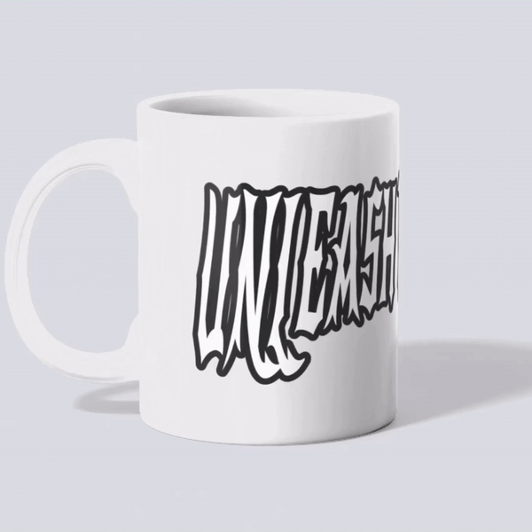 Animated rotating view of the Unleash The Power ceramic mug, displaying the bold text design from all angles.