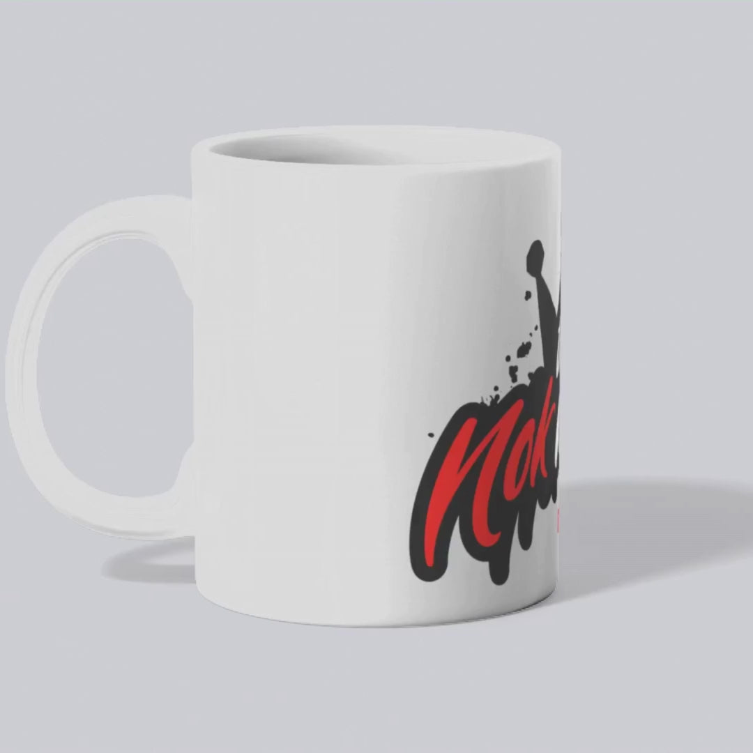 Stylish NOKMANIA coffee mug with iconic streetwear logo and splash design