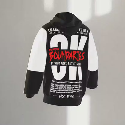 Back view of NOK Style Adult Hoodie showcasing bold red typography with the message "Breaking Boundaries."