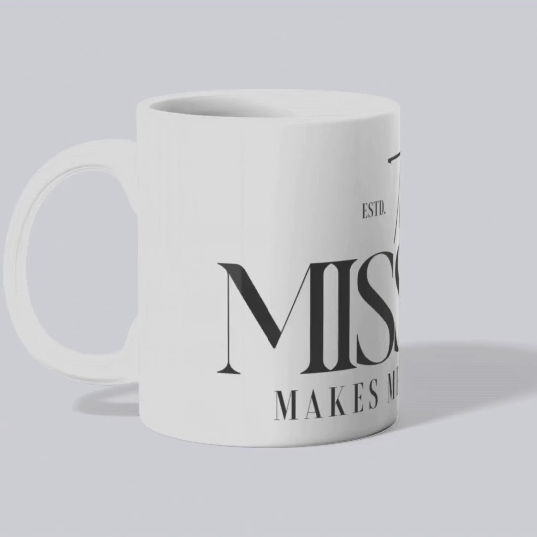 White coffee mug featuring 'The Mission Makes Me Stronger' slogan in bold typography, delivering daily inspiration and resilience with every sip.